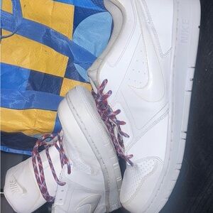 THE NIKE SB DUNK LOW "TRIPLE WHITE"